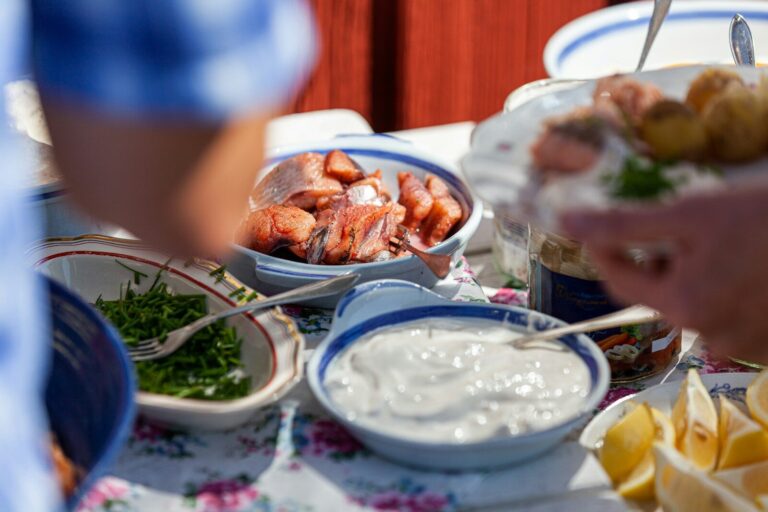 Food and sauces are served on a table