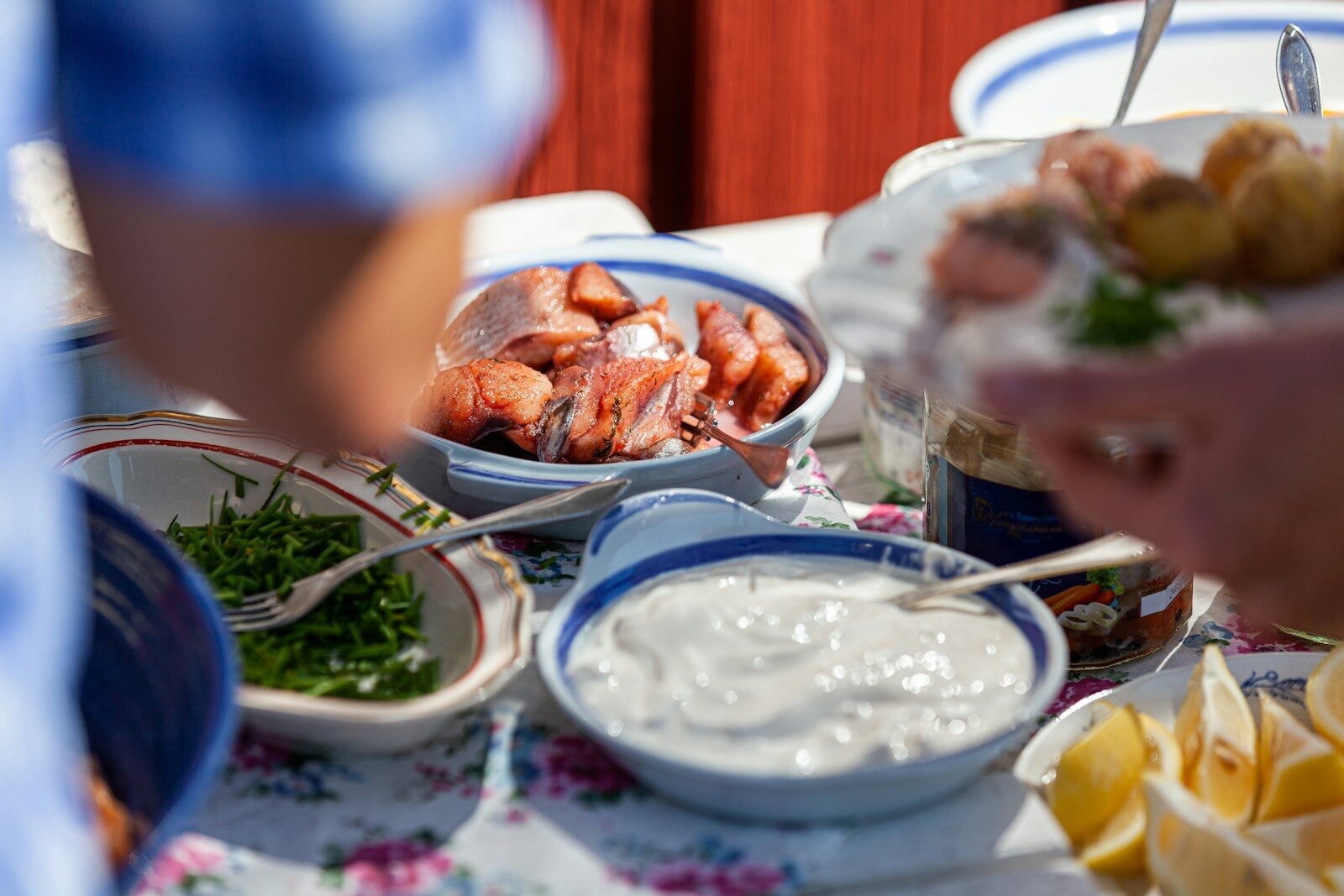 Food and sauces are served on a table